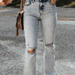 Distressed Light Washed Slit Knee Flared Jeans