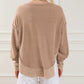 Exposed Seam Ribbed Thumbhole Sleeve Buttoned Sweatshirt