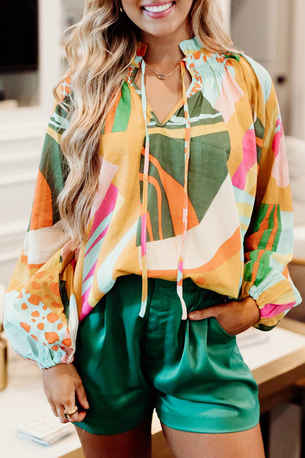 Printed Abstract Print Balloon Sleeve Notched Neck Blouse