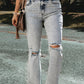 Distressed Light Washed Slit Knee Flared Jeans