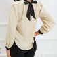 Color Block Bow Back Mock Neck Blouse