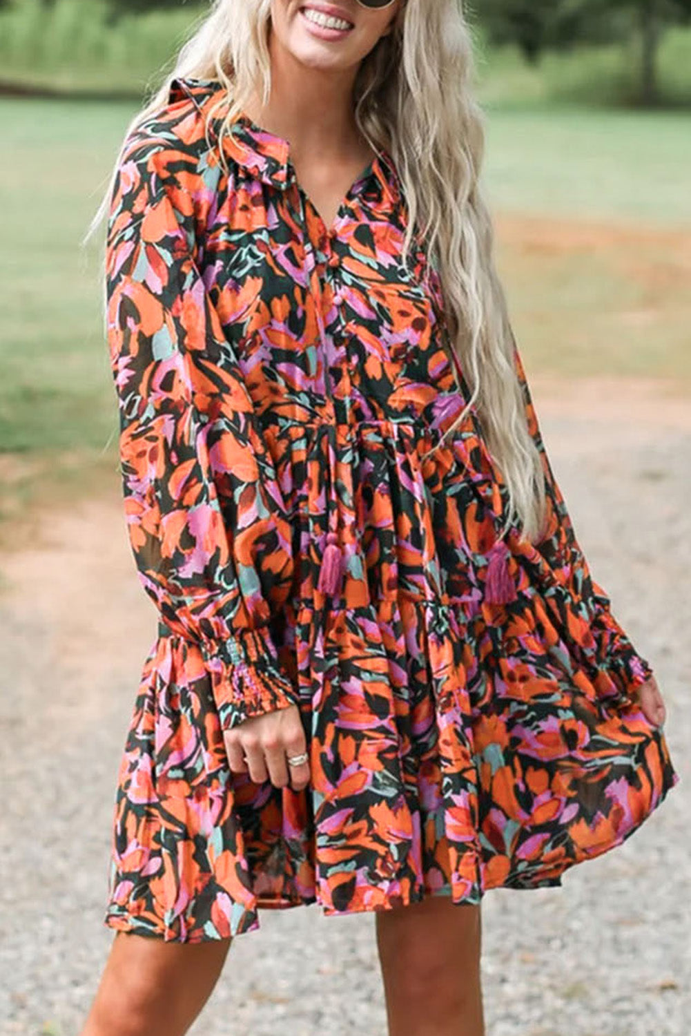 Floral Smocked Bishop Sleeve Tassel Mini Dress