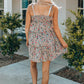Flower Print Tiered Frilled Knotted Spaghetti Strap Mini Dress