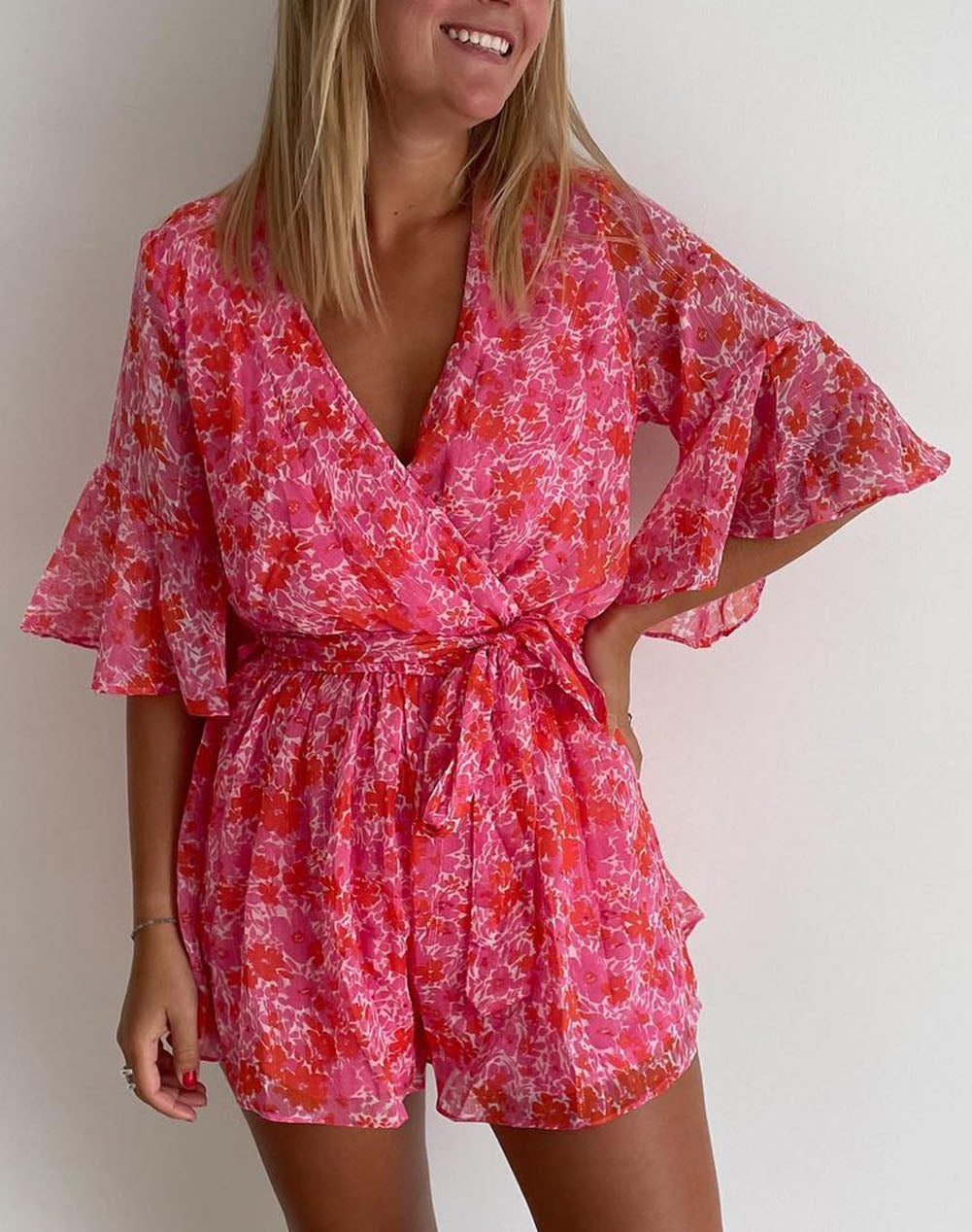 Pink V Neck Ruffled Sleeve Floral Romper