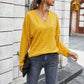 Simple solid color V-neck blouse