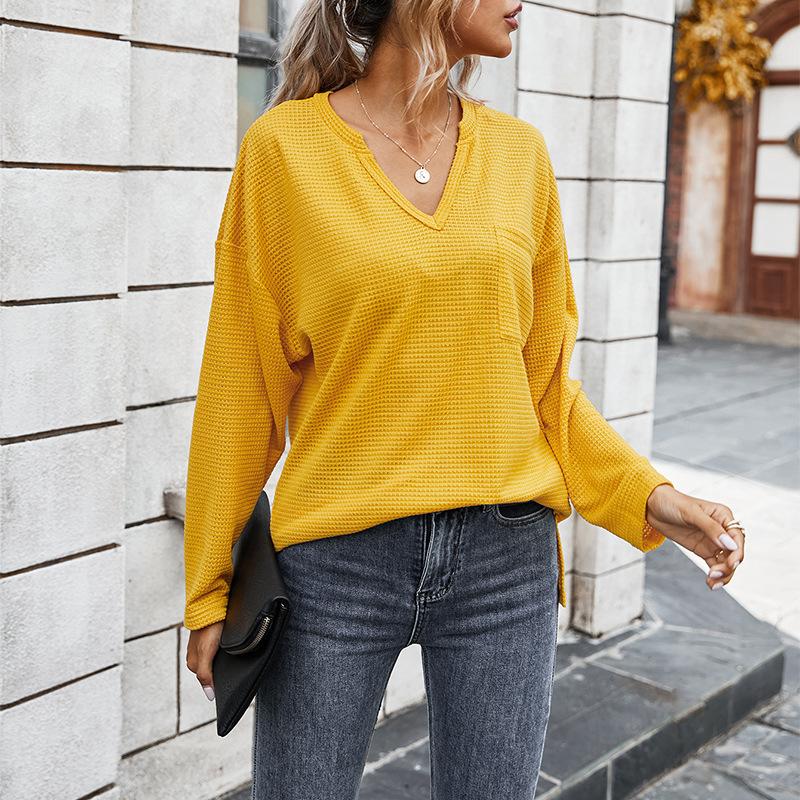 Simple solid color V-neck blouse