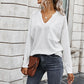 Simple solid color V-neck blouse