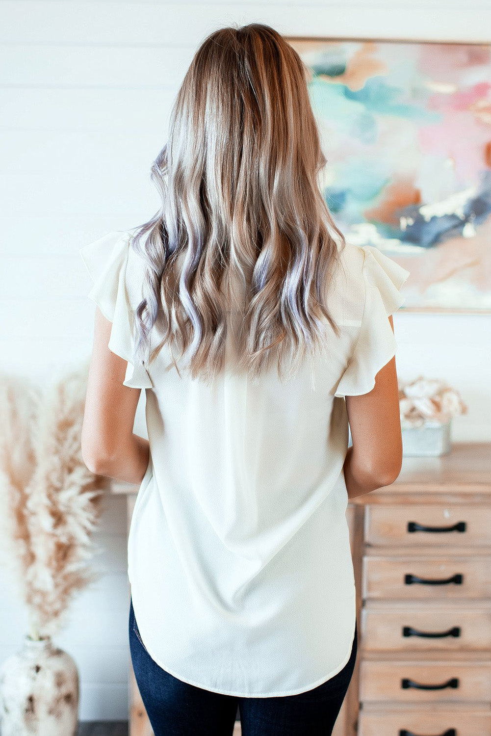 Ruffled Sleeveless V Neck Top