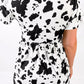 White Cow Spots Print V Neck Ruffled Casual Blouse
