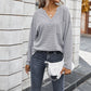 Simple solid color V-neck blouse